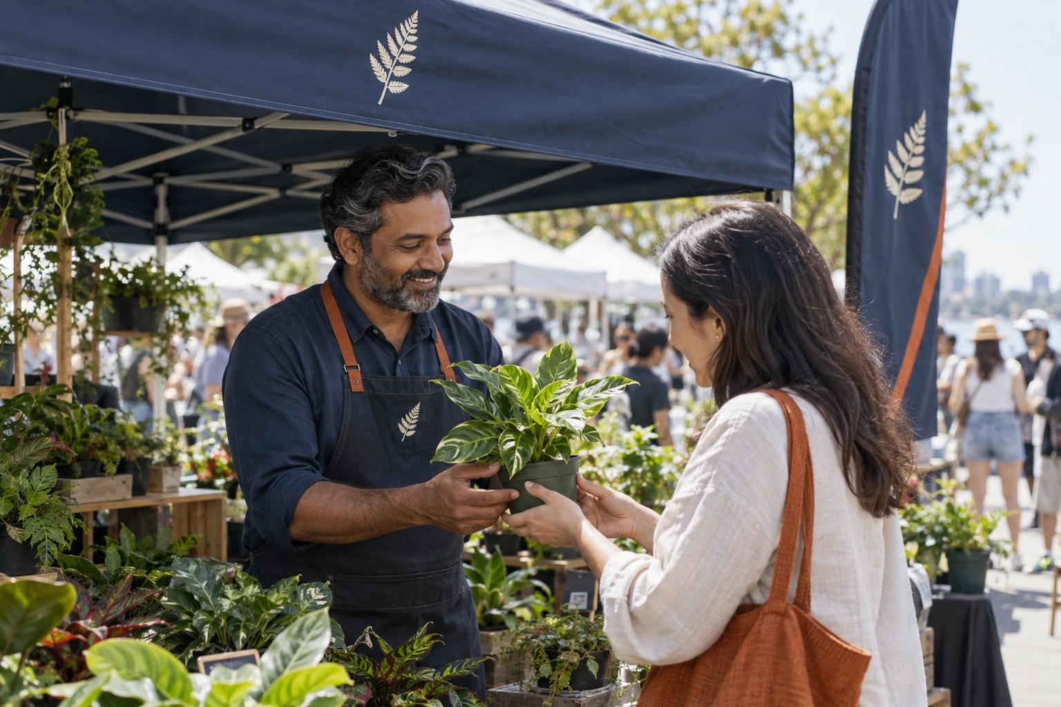 Cinematic artwork of a vendor under a printed canopy handing a plant to a visitor at an outdoor market